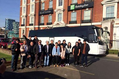 Happy group enjoying a Coach hire trip in Alicante